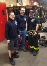 <b>Recently retired Captain Andrew Serra returned for a visit to Ladder 20 with firefighters Nick Avvento III (left) and Robert Colon (right) who served under him for nine and seven years, respectively.</b> Photo: Keith J. Kelly