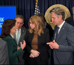 Governor Kathy Hochul (left) chats with local lawmakers including Assembly members Tony Simone (rear) and Linda Rosenthal and NYS Senator Brad Hoylman-Sigal after the Nov. 14 announcement that she is “unpausing” congestion pricing toll. All three lawmakers are supportive of the toll that Houchul plans to start on Jan. 5.