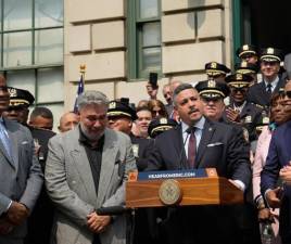 NYPD Commissioner Edward Caban at a press conference earlier this year. His cell phone was seized during a raid on his home on Sept. 5. Other top aides to Eric Adams also had homes raided that day.