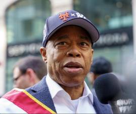 Mayor Eric Adams wore a cap with both the Mets/Yankees logos during the Columbus Day parade. At his weekly press conference on Oct. 22, he admitted he’s a Mets fan, but his partner is a Yankees fan. And much like our columnist, he wishes the Yankees well in the World Series.