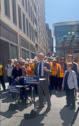 MTA CEO Janno Lieber (center) celebrates the August 22 opening of three new elevators at the 14th St./6th Ave. subway station. He was joined by MTA Chief Accessibility Officer Quemuel Arroyo (left, at microphone), State Senator Brad Hoylman-Sigal, and State Assembly Member Deborah Glick (right).