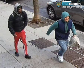 NYPD-supplied surveillance image of two young people thought to be robbers armed with a knife.