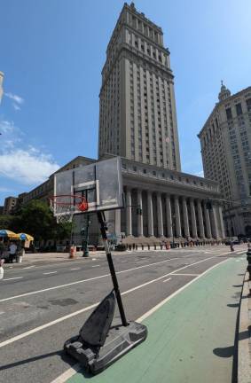 Anyone for hoops? Centre Street looking southwest towards the Foley Square courthouse and Municipal Building.