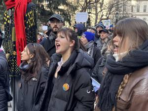 NYU student Emma (center) came to an anti-Trump rally at City Hall Park on Feb. 5 to support transgender rights and immigrant rights.