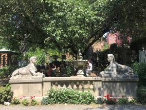 The sphinx statues at the entrance of the Elizabeth St. Garden.