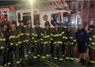 Firefighters on the on the early morning of February 5, 2023. Brendan Gaffney fifth from left.