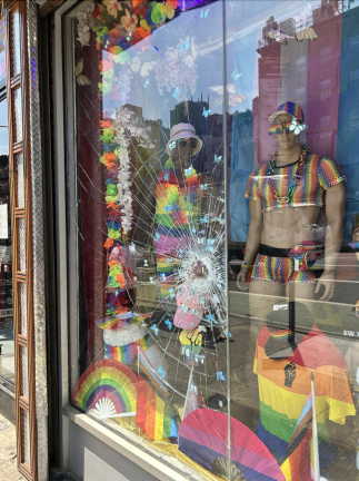 <b>The store’s glass display window is completely shattered after a man threw a huge rock at it in December. </b>