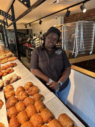 Adama Diouf, the manager of Marie Blachere, is one of about 15 staffers who will be out of a job when the little bakery in the West Village, which has been around for nearly 20 years, shuts down on Jan. 19.