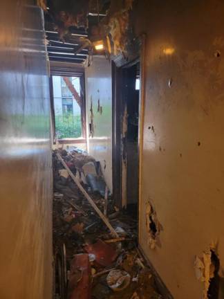 Antonio Fierro’s apartment hallway after the fire. Photo: SoHo guy