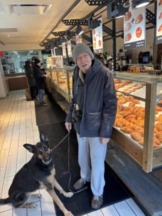 John Wilton, accompanied by his German shepherd, said he only learned of the store’s pending demise on Jan. 11. He said he frequently stops in to buy a beget or a sandwich.