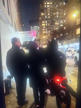 The moment when an enraged e-biker punches a British tourist in the face moments after an encounter on Third Ave. near E. 69th St.