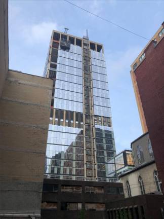 Vornado Realty Trust has halted new office space developments in the Penn Station area but this one on the Madison Square Garden side looming over W. 31st St. is one of only two still being built by the developer in the neighborhood. Photo: Keith J. Kelly