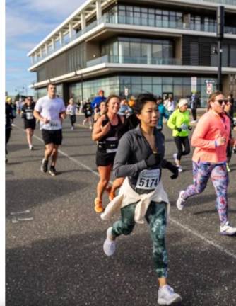 Andrea Kwok (#5174) competes in a half marathon in Asbury Park, N.J. in April.