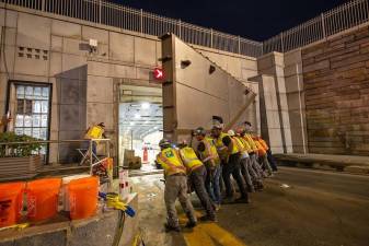 It’s an open and shut case when it comes to these 25-ton Queens Midtown Tunnel flood doors.