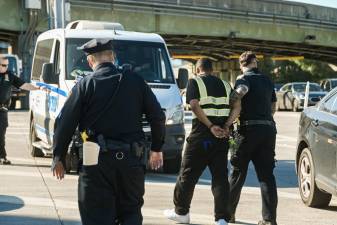 Interagency vehicle enforcement operation at the Hugh L. Carey Tunnel on Wednesday, May 22, 2024. NYPD. (Marc A. Hermann / MTA)