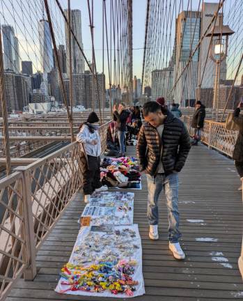 Dozens of Illegal Vendors— &amp; One Giant Ape—Reclaim Brooklyn Bridge from City