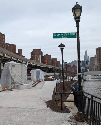 <b>This portion of the East River Esplanade is named for legendary firefighter Captain Patrick Brown, a longtime Stuyvesant Town resident who served in Rescue 1 in midtown Manhattan when his unit made a rare rope roof rescue of two people from a mid-town Manhattan apartment building that is still taught to probie firefighters at the Randall’s Island Fire Academy. He perished in the North Tower of the WTC on 9/11</b>. Photo: Brain Berger