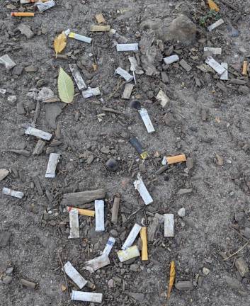 Smoke smoke smoke smoke that cigarette! Under the cleanup, more trash.