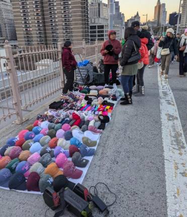 Dozens of Illegal Vendors— &amp; One Giant Ape—Reclaim Brooklyn Bridge from City