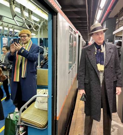 Mr. Inside and Mr. Outside, ne’er the train shall meet....or will it? Mr. Inside, wearing clothes from today, happily using his iPhone to document the trip—Mr. Outside, replete with fedora, maybe thinking about how he was going to pitch his latest Ad to a client on Madison Avenue.