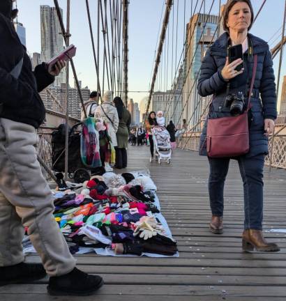 Dozens of Illegal Vendors— &amp; One Giant Ape—Reclaim Brooklyn Bridge from City