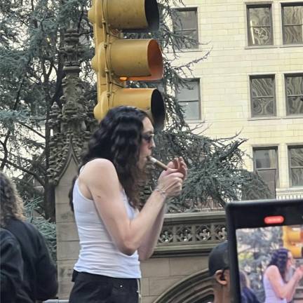 The NY Liberty’s Breanna Stewart lights up a victory stogie.