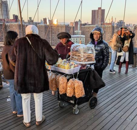 Dozens of Illegal Vendors— &amp; One Giant Ape—Reclaim Brooklyn Bridge from City