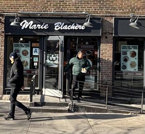 A patron exits Marie Blachere, a beloved French bakery in the West Village which is closing on Jan. 19.