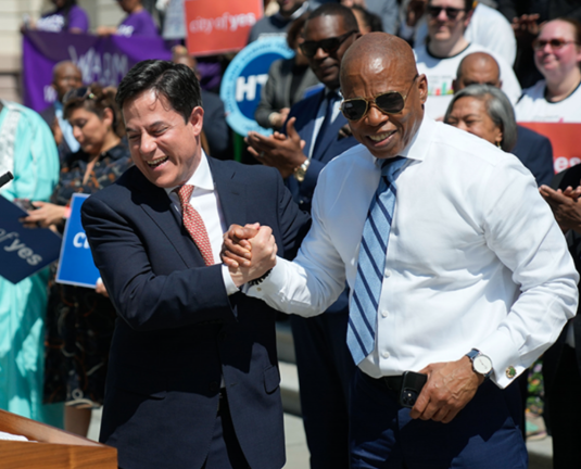 NYC Planning Commission Chair Dan Garodnick (left) and Mayor Eric Adams during a April 29 rally that promoted the “City of Yes” zoning amendments designed to help alleviate the city’s housing crisis. The draft text entered public review that same day. ( Photo via nyc.gov)