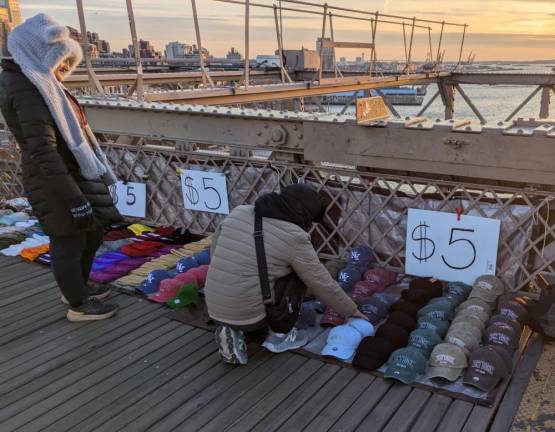 Dozens of Illegal Vendors— &amp; One Giant Ape—Reclaim Brooklyn Bridge from City