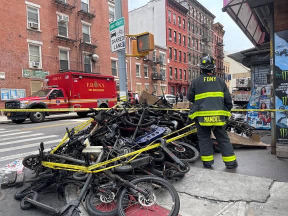 Charred remains of bikes whose lithium ion batteries erupted during a fire in an e-bike sale and repair shop on 80 Madison St. on the Lower East Side. Four people were killed in the June, 2023 fire.