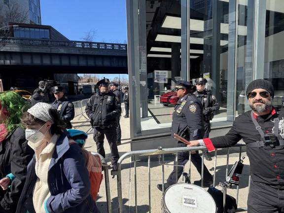 Police set up a barricade around the Tesla showroom on Washington Street in the Meatpacking District, but that did not prevent a half-dozen protestors from entering the showroom and getting arrested as the largely peaceful crowd was breaking up after a two-hour rally,