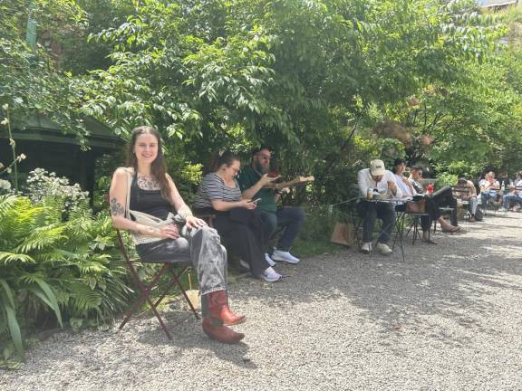 Alexandra Russo, who works a couple blocks away and comes to the garden every day to sit down and enjoy nature at Elizabeth Street Garden in SoHo.