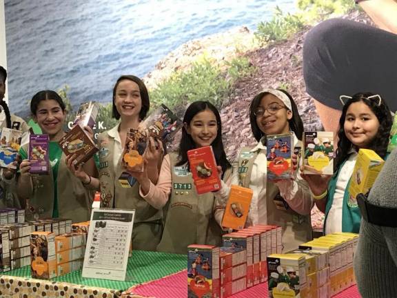 Young Prokop selling cookies with other fellow girl scouts.