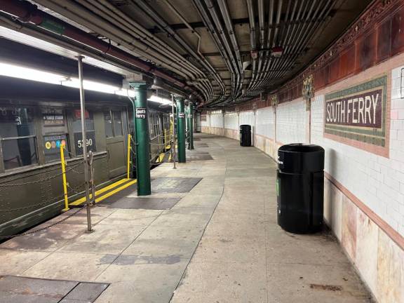 The four-car 1917-built train awaits its nostalgia passengers at the old South Ferry Station, last used in the aftermath of Hurricane Sandy. On October 27, 500 passengers on two trips used the famous curved platform once again.