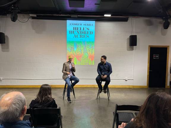 Filmmaker Jamie Fitzpatrick (right) and author Andrew Serra at the book launch party for the novel <i>Hell’s One Hundred Acres,</i> held at the community space DCTV, which is in the historic building that once housed FDNY Engine 31 on Lafayette Street.