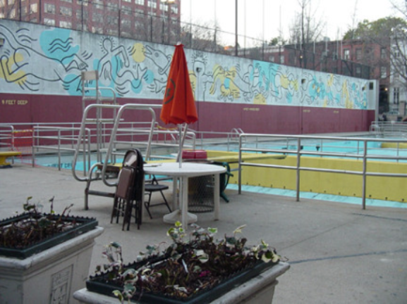 The Keith Haring mural at the Tony Dapolito Recreation Center’s outdoor pool.