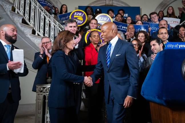 New York Governor Kathy Hochul and NYC Mayor Eric Adams celebrating the passage of the “City of Yes” zoning overhaul, which is projected to create 82,000 new units over the next 15 years.