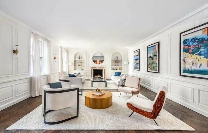 The living room of the swanky co-op that was owned by the American Museum of Natural History until Nov. 26, when it was sold to a partner at the law firm of Sullivan &amp; Cromwell.