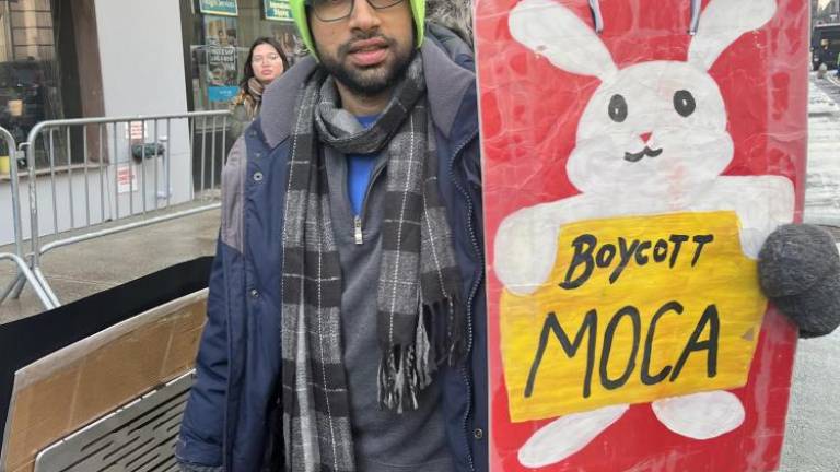 One protester ran out of time to make an up-to-date protest sign, so he brought the one from last year’s CNY celebration picket (the Year of the Rabbit).