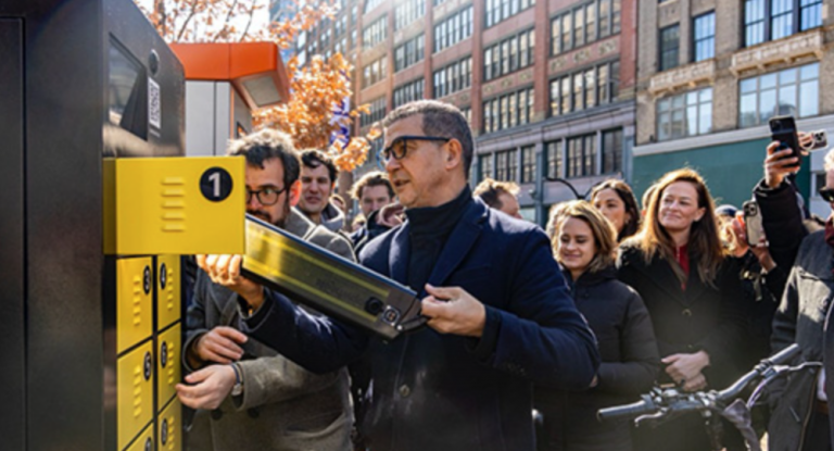 DOT Commissioner Ydanis Rodriguez using a pilot e-bike battery charging station, as part of Eric Adams’s “Charge Safe, Ride Safe” campaign. The agency claims that after five months, the pilot has massively boosted safe battery swaps.