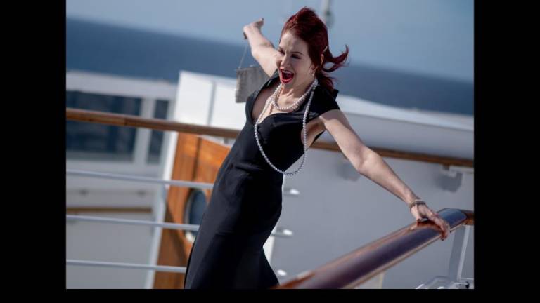 Singing to the sky at the pinnacle of the QM2.