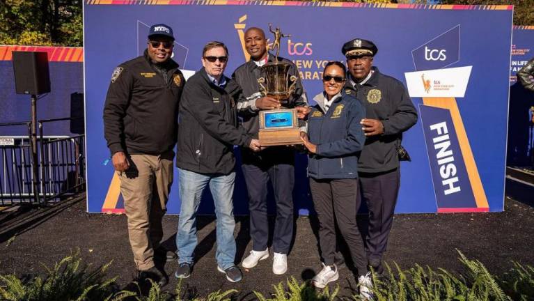 Top cops (left to right): Caz Daughtry, Thomas Donlon, Tarik Shepherd, Tania Kinsella and Geoffrey Maddrey pose with the Mayor’s Cup trophy.