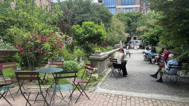 Elizabeth Street Garden in SoHo on May 29, 2024. This green space has been at the hub of ongoing debate between the people who want to save the garden and the city that wants to solve the senior affordable housing crisis, by installing 123 apartments for homeless and low-income senior citizens, at the expense of New York City’s few green spaces. Photo Credit: Alessia Girardin.