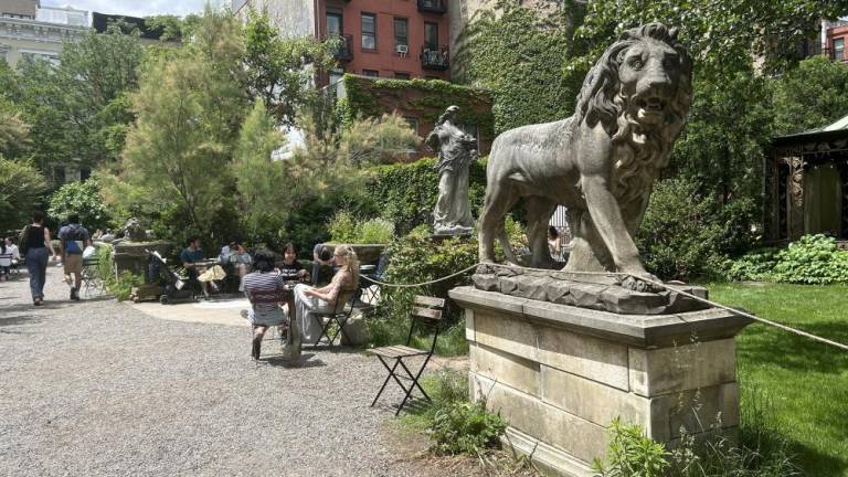 Elizabeth Street Garden in SOHO features many sculptures and is a sliver of green space amidst surrounding apartment buildings, restaurants and boutiques. Photo Credit: Alessia Girardin.