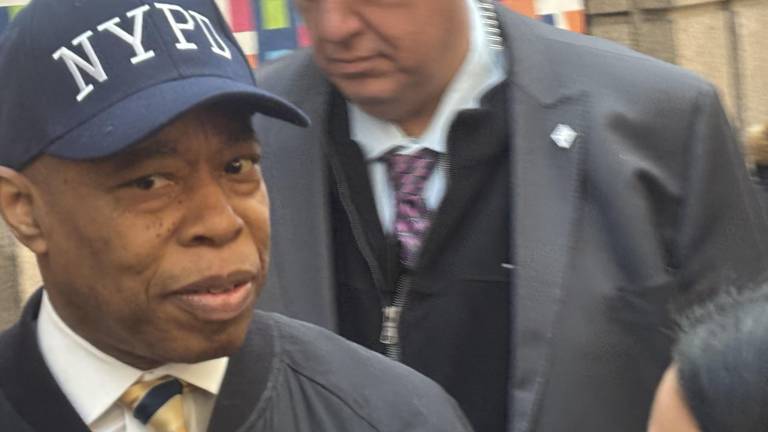 Mayor Eric Adams calls reporters “liars,” as he leaves a press conference at Bellevue Hospital Feb. 18 where an NYPD office had been taken after getting shot. He refused to answer questions about his embattled administration which saw four deputy mayor’s resign. Calls are growing for him to resign.