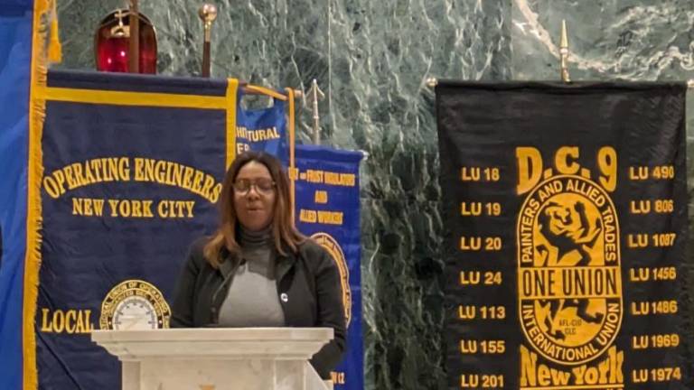 New York State Attorney General Letitia James at the podium.