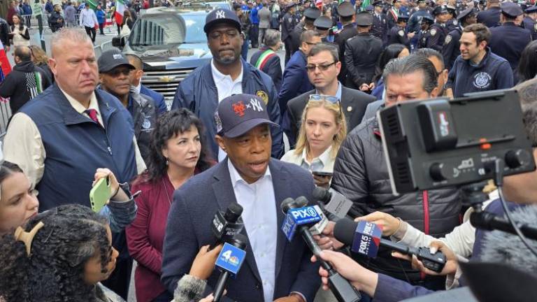 Mayor Adams in a combined Mets - Yankees hat at the Columbus Day Parade, October 14, 2024.